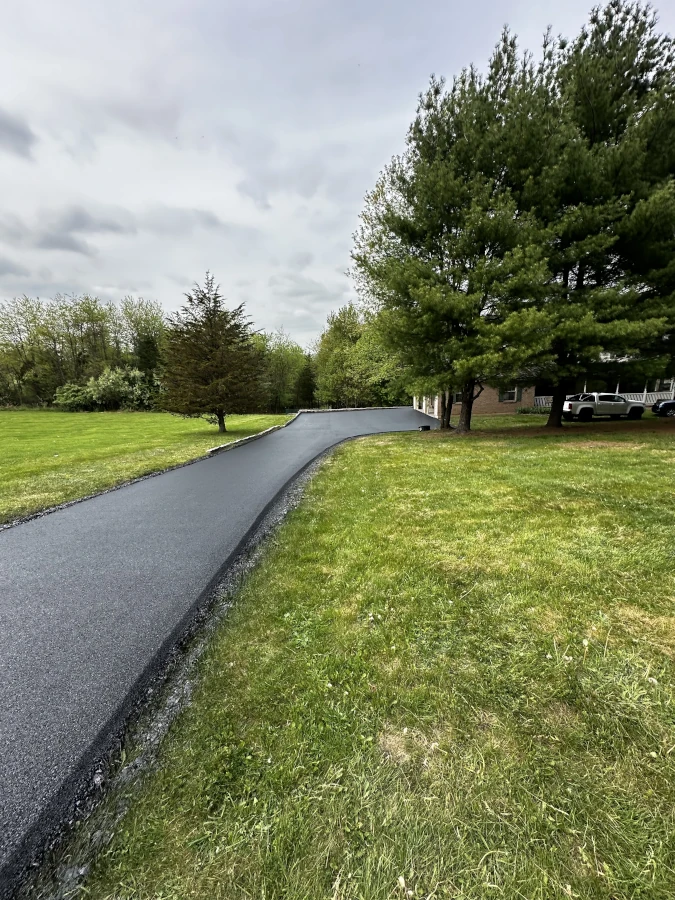 Fresh asphalt paving surface completed by Coopers Asphalt LLC
