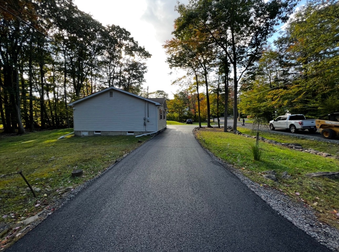 Fresh asphalt paving project completed by Coopers Asphalt LLC