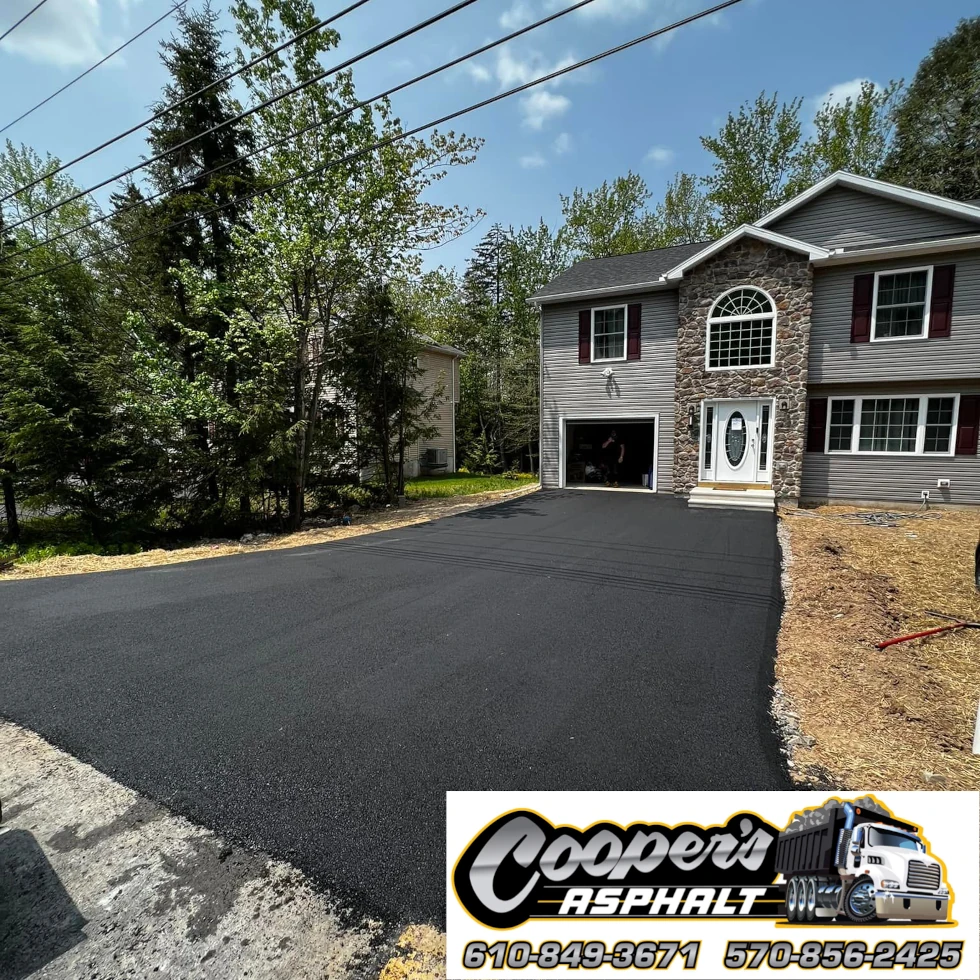 Asphalt paving equipment working on a Pennsylvania property